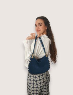 Bolso tachas laterales