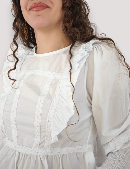 IMG_20260914_105752 Blusa volantes Roma